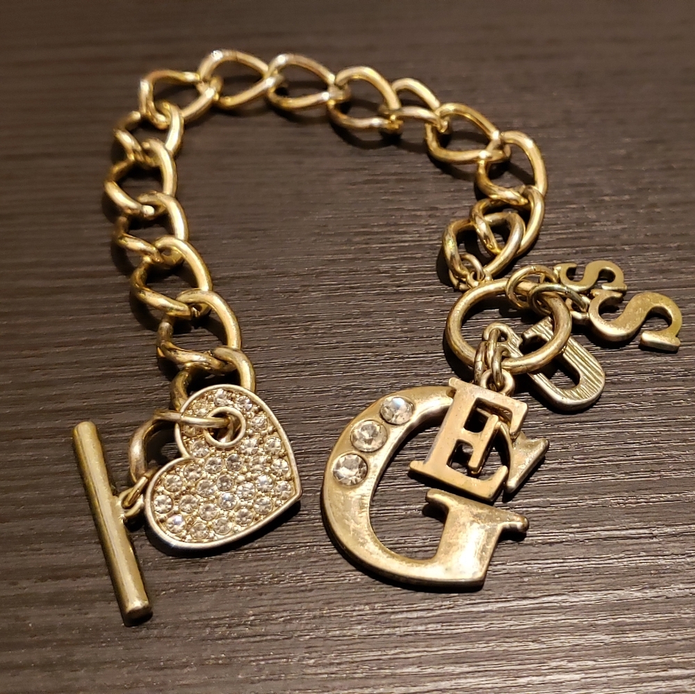 Gold guess braclet